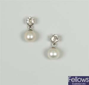 Cultured pearl and diamond stud earrings with a