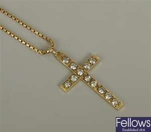 18ct gold diamond set cross pendant with twelve