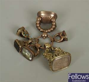 Six fobs to include an ornate large fob with