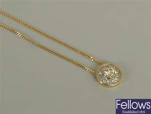 18ct gold diamond cluster pendant with a central