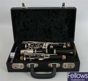 An 'IHAGEE' vintage camera, a clarinet in fitted