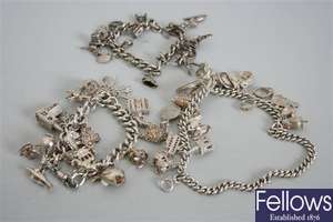 Three hallmarked silver charm bracelets with