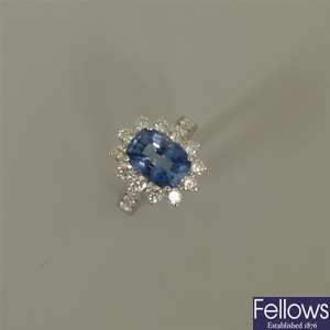 18k white gold sapphire and diamond cluster ring,