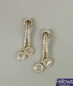A pair of 18k gold diamond set dropper earrings,