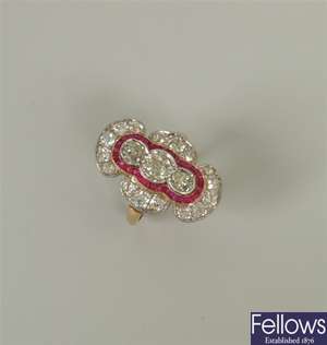 An Art Deco style ruby and diamond up finger
