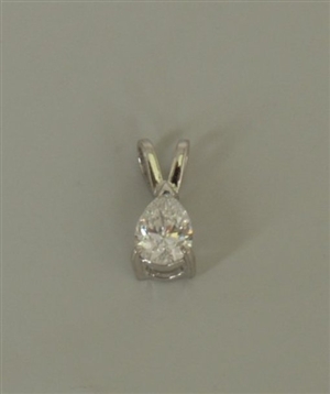 A single stone pear shape diamond pendant, in a