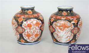 A pair of 19th century imari baluster vases, each