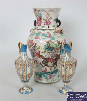 A pair of bottle shaped porcelain vases, the