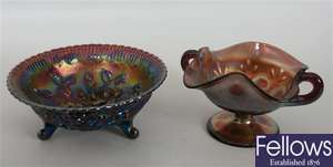 A collection of various carnival glass to include