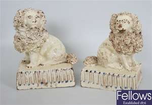 A pair of early 19th century pottery figures of