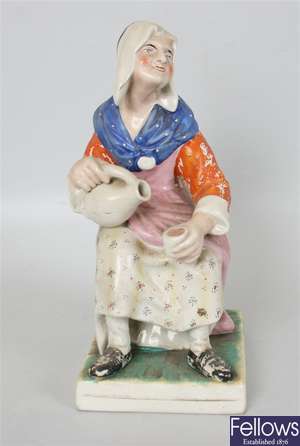A late 19th century large pottery figure of a