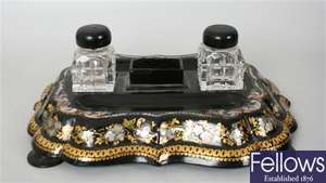 A 19th century black lacquered papier mache and