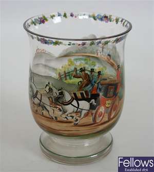 A shaped glass vase with hand painted decoration