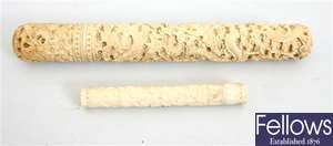A 19th century carved ivory needle case of