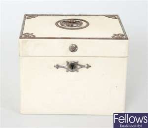 A 19th century simulated ivory tea caddy of