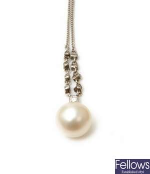 An 18ct white gold diamond and baroque pearl