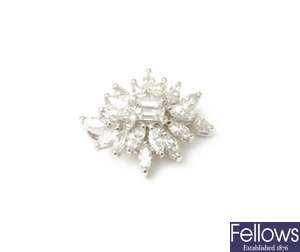 An 18ct white gold diamond cluster pendant with a
