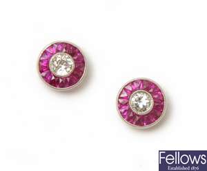 A pair of diamond and ruby cluster stud earrings,