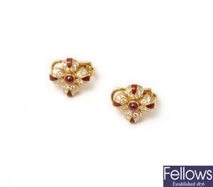 A pair of ruby and diamond cluster stud earrings
