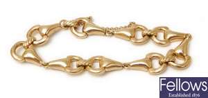 A 9ct gold horses bit bracelet, comprising of