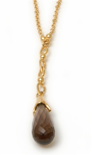 A 9ct gold smokey quartz set pendant, in the