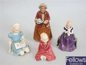 Four Royal Doulton bone china figurines to