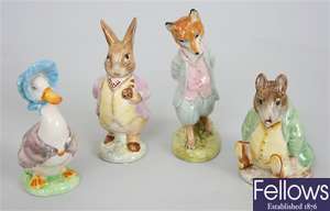Four Beatrix Potter's figures to include 'Foxy