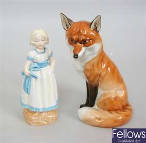 A Royal Worcester figurine of a young girl