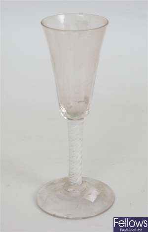 An antique wine glass with fluted drawn trumpet