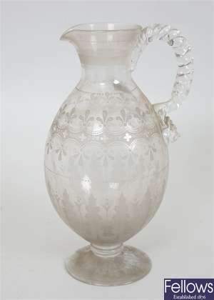 A selection of antique and later decanters and