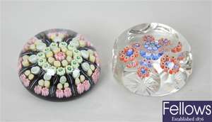 A Milliefiori glass paperweight with twist multi