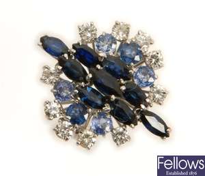 A sapphire and diamonds cluster ring with a