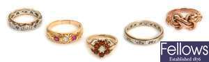 Four rings, to include a 9ct gold garnet and opal