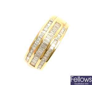 An 18ct gold baguette cut diamond band ring, with