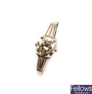 A platinum and diamond solitaire ring with