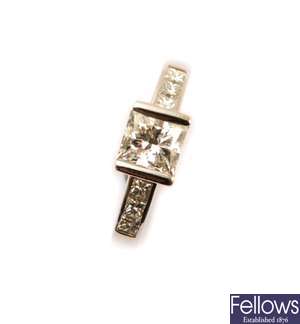 A platinum princess-cut diamond solitaire ring