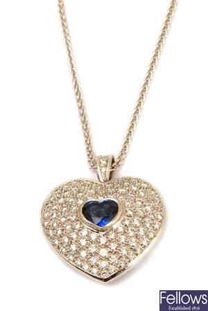 A pave set diamond heart shape pendant with