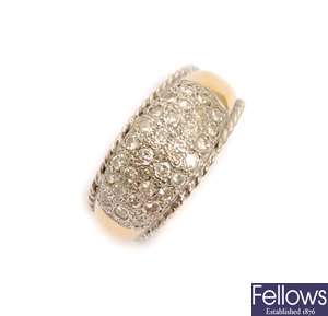 An 18ct gold diamond set band ring, with a