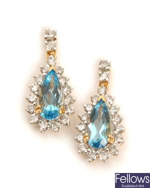 A pair of 18ct gold blue topaz and diamond