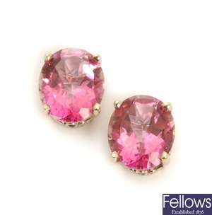 A pair of oval coated pink topaz stud earrings,