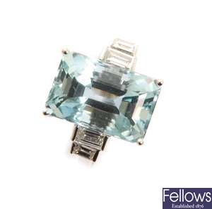 An aquamarine and diamond ring, comprising a