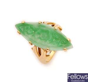 An 18ct gold carved jade marquise shape up finger