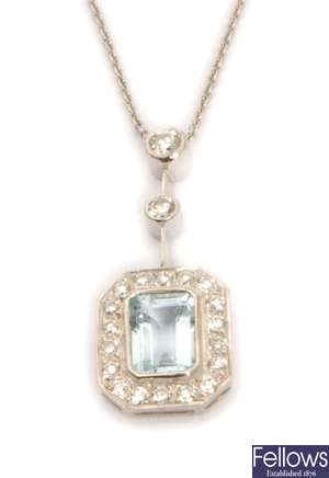 An aquamarine and diamond pendant, comprising two