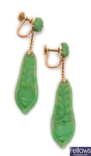 A pair of carved jade dropper earrings, with a