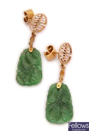 A pair of carved jade dropper earrings, with an