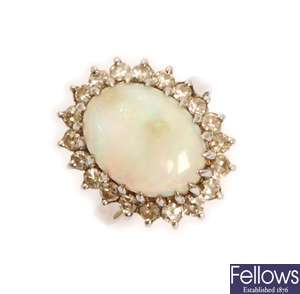 An 18ct gold opal and diamond cluster ring,