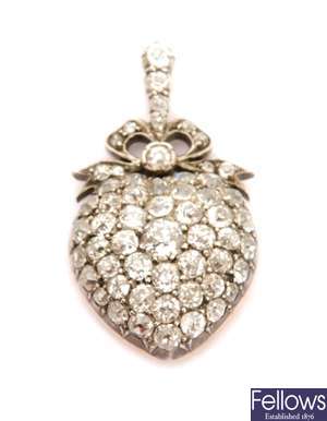 A Victorian heart shaped diamond set pendant with