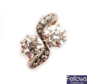 A two stone diamond ring in a crossover design