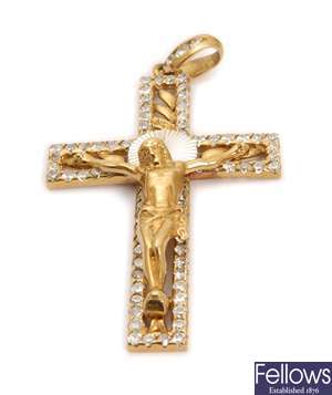A 9ct gold crucifix pendant, with outer