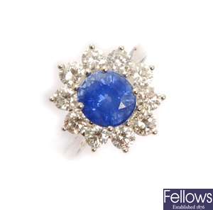 A sapphire and diamond cluster ring, comprising a